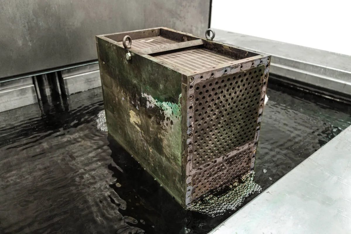 Fouled Jenbacher charge air cooler as received, entering the cleaning bath