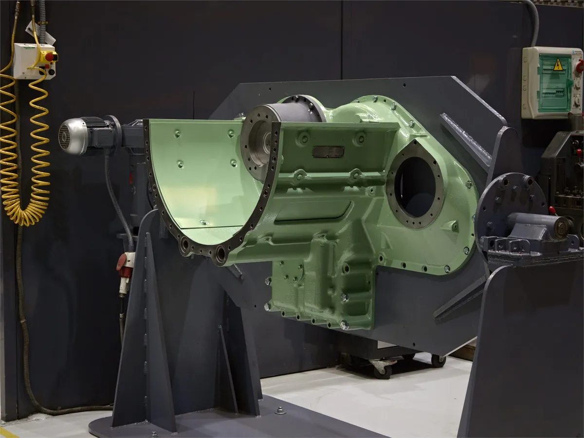 EMD turbocharger housing mounted on the workshop positioner