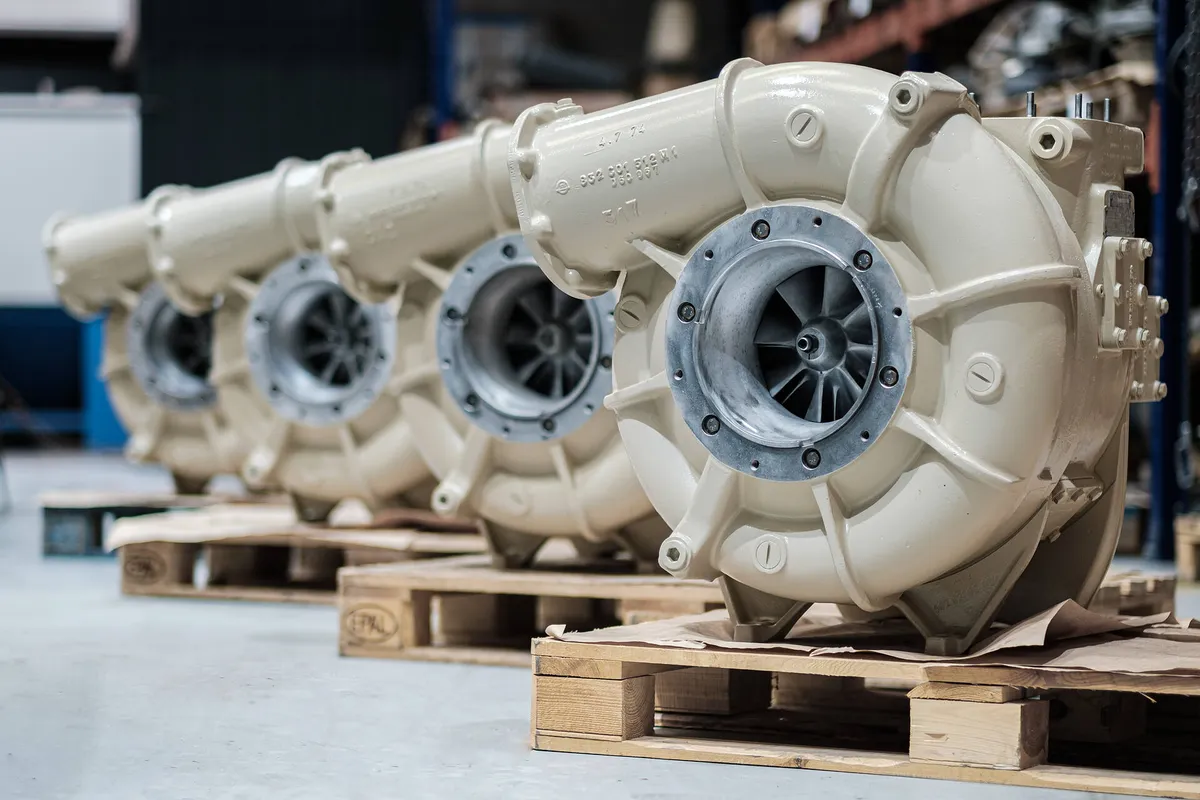 Overhauled MTU AGL 340 turbochargers on pallets in the workshop