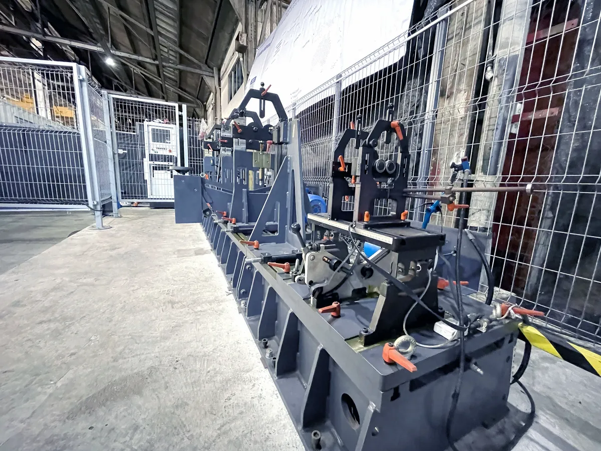 Balancing machine bed inside its fenced area at the Balboa (Panama City) workshop