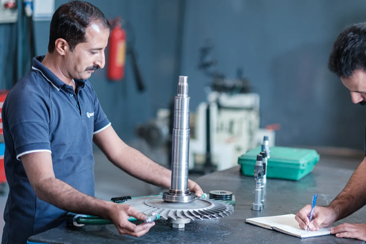 Rotor shaft and turbine wheel on the inspection bench at Lahore