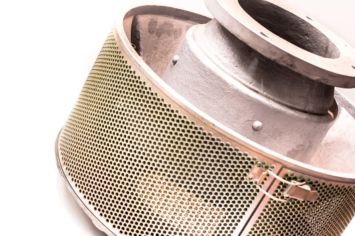 Air filter silencer showing the perforated panel and the filter mesh